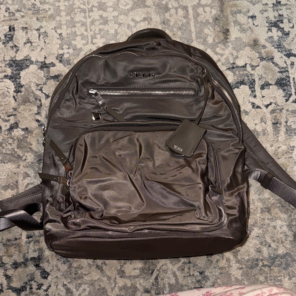 Tumi Stylish grey Backpack